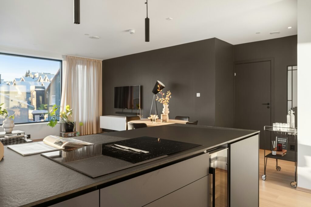A kitchen with a large island in the middle of it