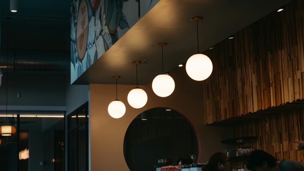 a group of people sitting at a table in a restaurant